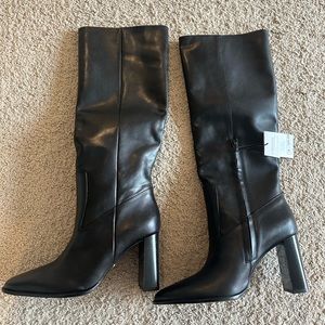 Blocked Heeled Knee High boots.